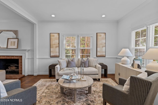 living room with a fireplace, crown molding, plenty of natural light, and dark wood-type flooring