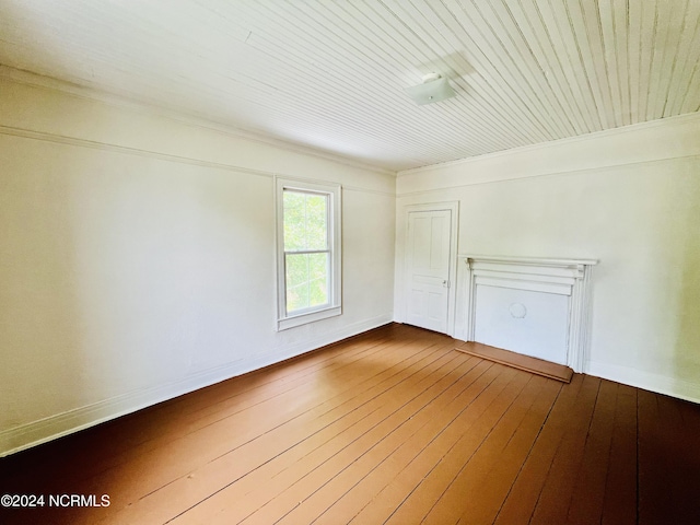 spare room with hardwood / wood-style floors