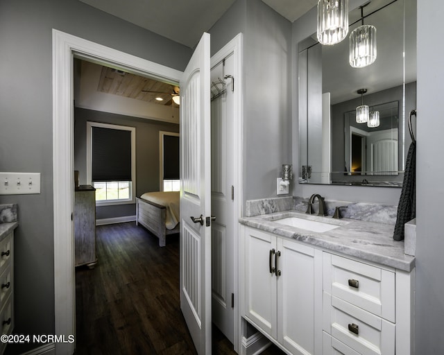 bathroom with vanity and hardwood / wood-style flooring