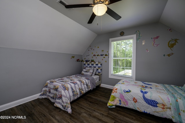 bedroom with dark wood-type flooring, ceiling fan, and lofted ceiling