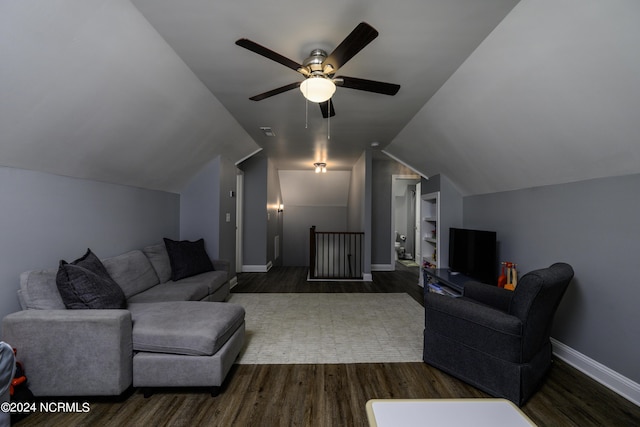 living room featuring dark wood-type flooring, ceiling fan, lofted ceiling, and built in shelves