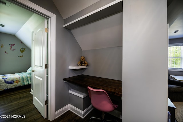 office area with dark hardwood / wood-style floors and lofted ceiling