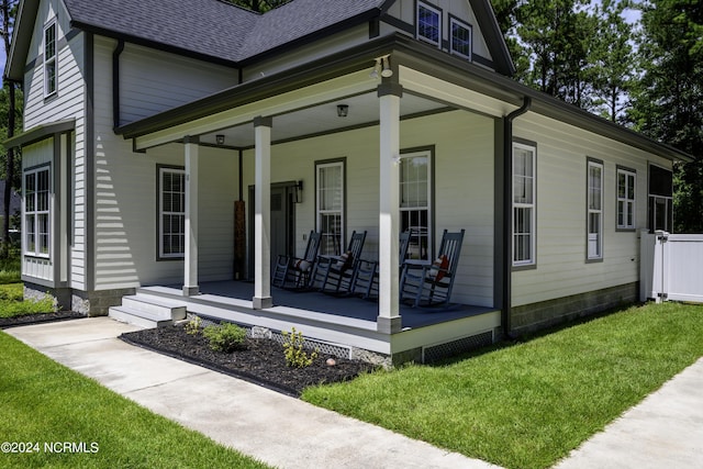 view of home's exterior with a porch