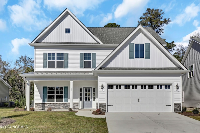 craftsman house with a front lawn, central AC, and covered porch