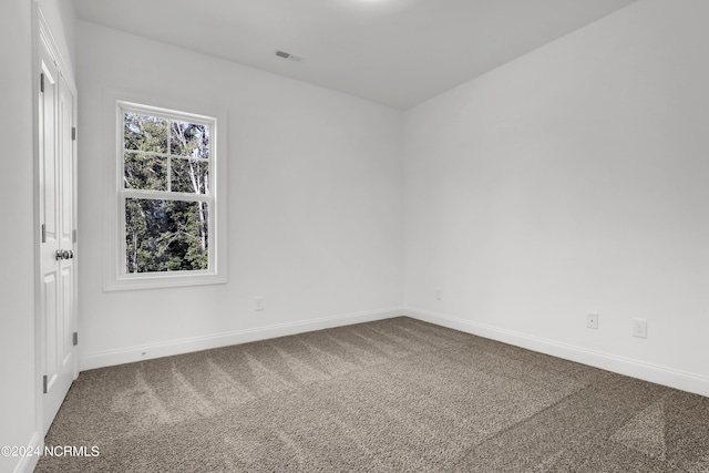 65 Tilloo Cut Way, Hampstead, NC 28443 - carpeted empty room featuring baseboards