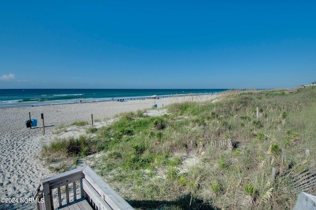 view of water feature with a beach view