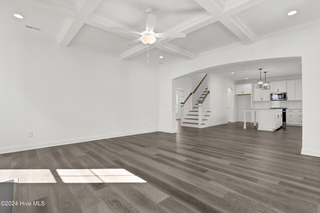133 Tilloo Cut Way, Hampstead, NC 28443 - unfurnished living room featuring coffered ceiling, recessed lighting, beam ceiling, dark wood-style flooring, and ceiling fan