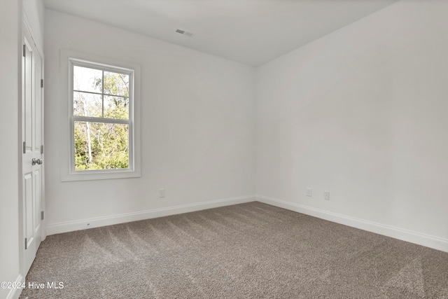 view of carpeted spare room