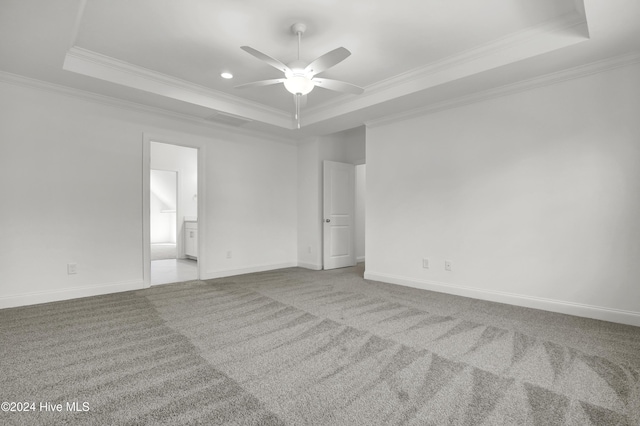 133 Tilloo Cut Way, Hampstead, NC 28443 - carpeted empty room with a tray ceiling, crown molding, a ceiling fan, baseboards, and recessed lighting