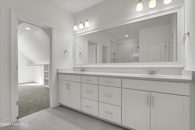 133 Tilloo Cut Way, Hampstead, NC 28443 - full bath featuring marble look tile flooring, double vanity, and a tile shower