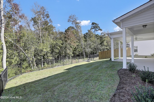 133 Tilloo Cut Way, Hampstead, NC 28443 - view of yard with a patio area and view of wooded area