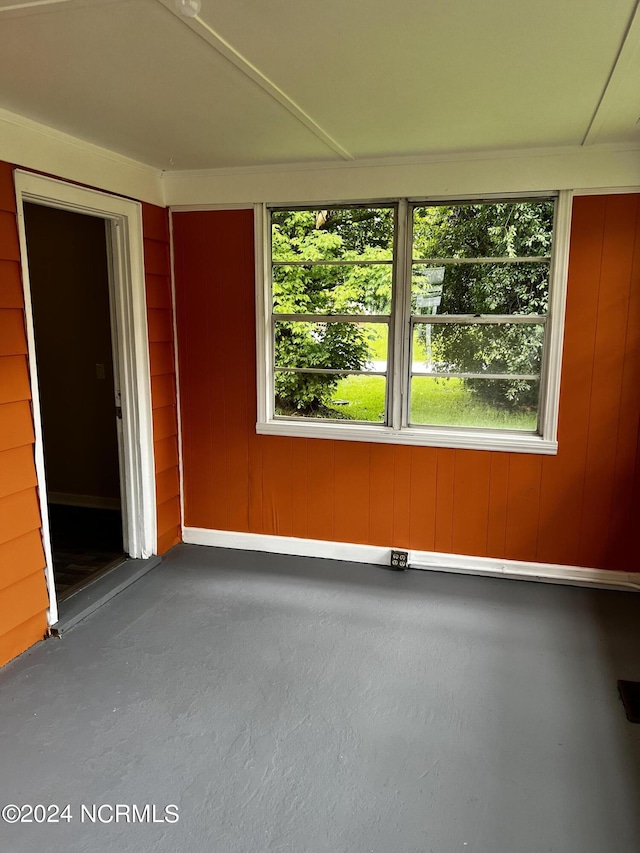 interior space featuring plenty of natural light and finished concrete floors