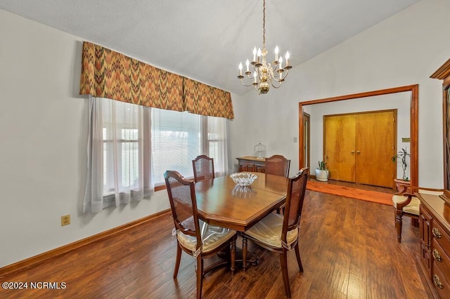 dining space with lofted ceiling, wood-type flooring, baseboards, and an inviting chandelier