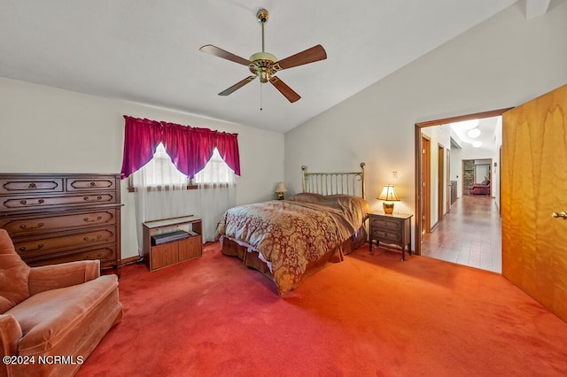 carpeted bedroom with lofted ceiling and ceiling fan