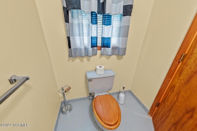 bathroom featuring toilet