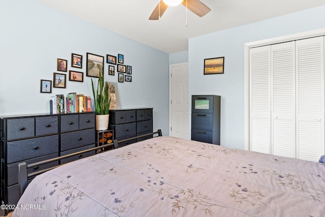 bedroom featuring ceiling fan and a closet