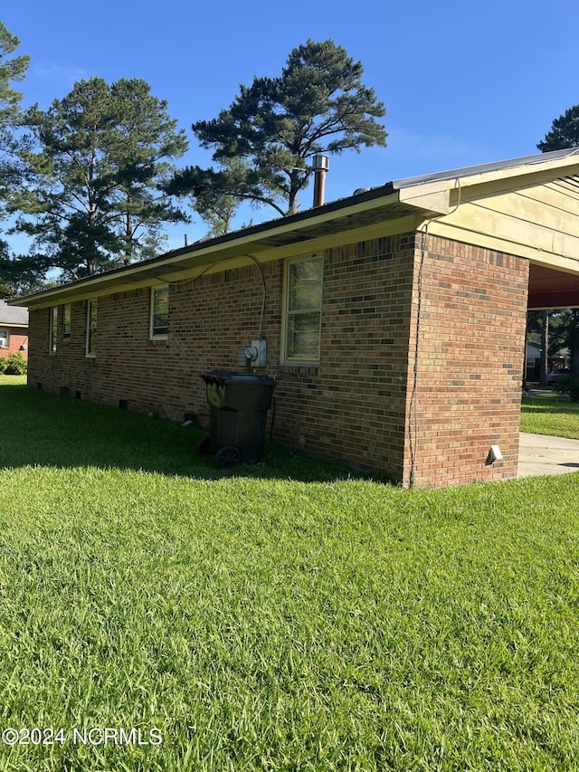 view of home's exterior featuring a lawn