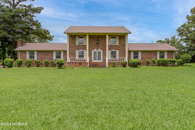 view of front of house with a front yard