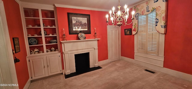 interior space with crown molding, a fireplace, and an inviting chandelier