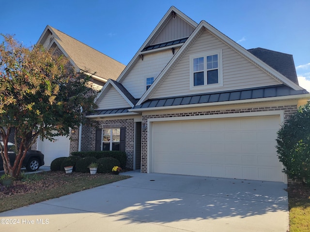 view of front of property featuring a garage