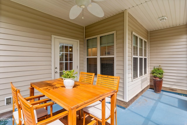 view of patio featuring ceiling fan