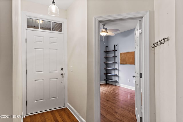 entrance foyer featuring dark hardwood / wood-style floors and ceiling fan