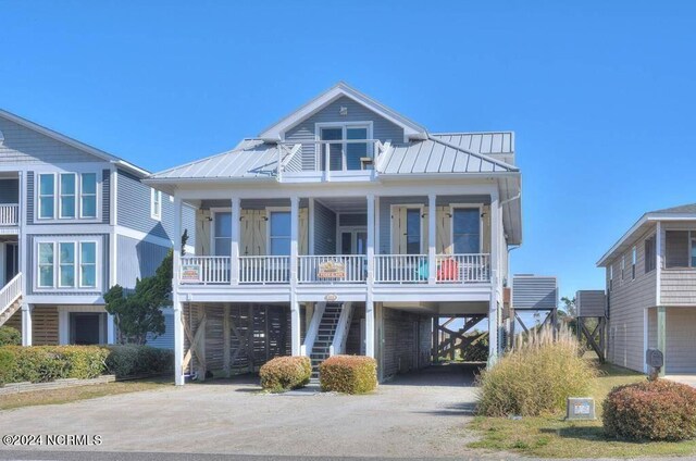 view of front of house featuring a carport