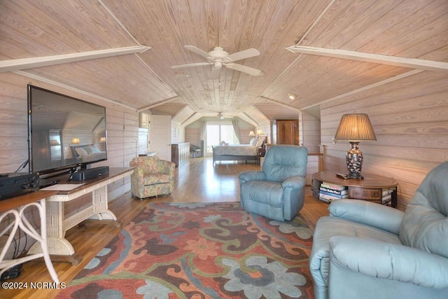 living room with ceiling fan, hardwood / wood-style flooring, wooden walls, lofted ceiling, and wood ceiling