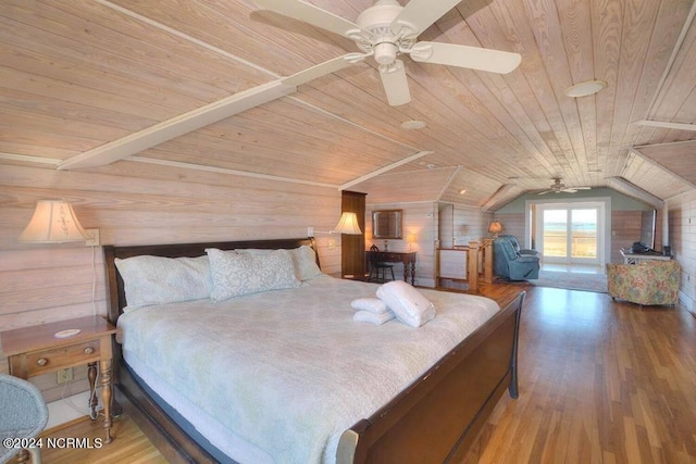 unfurnished bedroom featuring wooden walls, hardwood / wood-style flooring, and wood ceiling