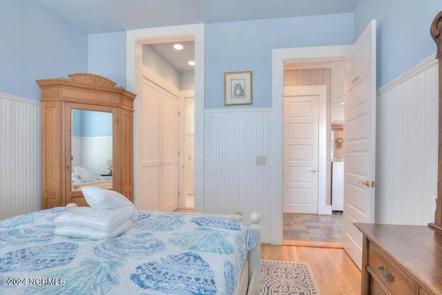 bedroom with light tile patterned floors