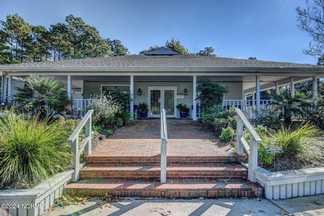 view of front of property featuring covered porch