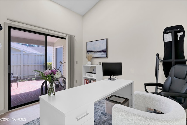 home office featuring light hardwood / wood-style floors and a wealth of natural light