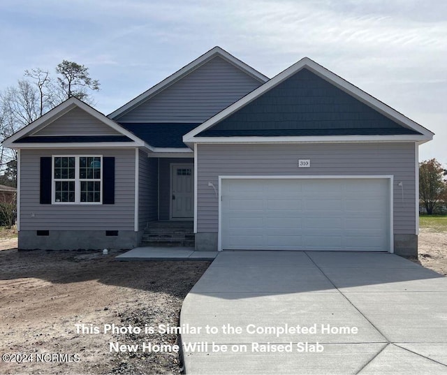 view of front of home with a garage