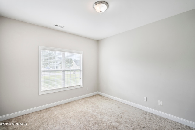 view of carpeted spare room