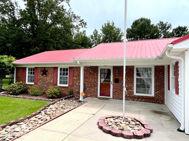 single story home with a patio area