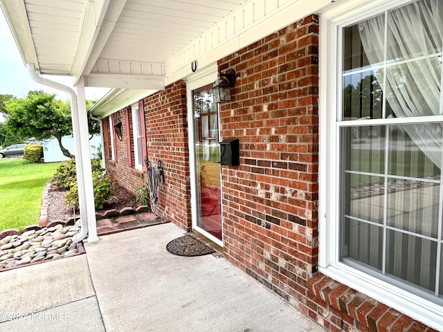 doorway to property with a porch