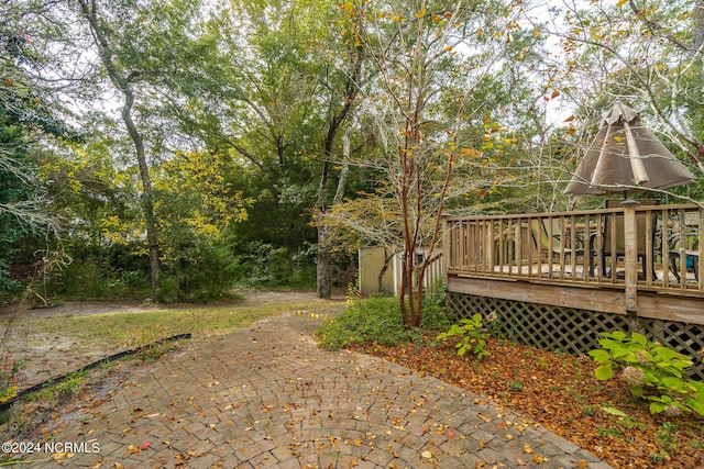 view of yard with a deck