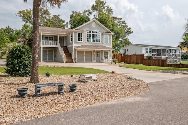 front facade featuring a garage and a porch