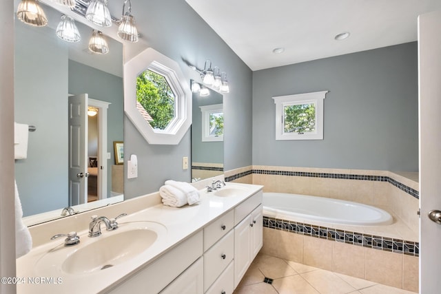 604 Currituck Way, Bald Head Island, NC 28461 - bathroom featuring tile patterned flooring, a bath, and double vanity