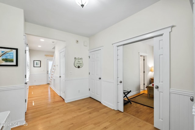604 Currituck Way, Bald Head Island, NC 28461 - foyer entrance featuring light wood-style floors and a wainscoted wall