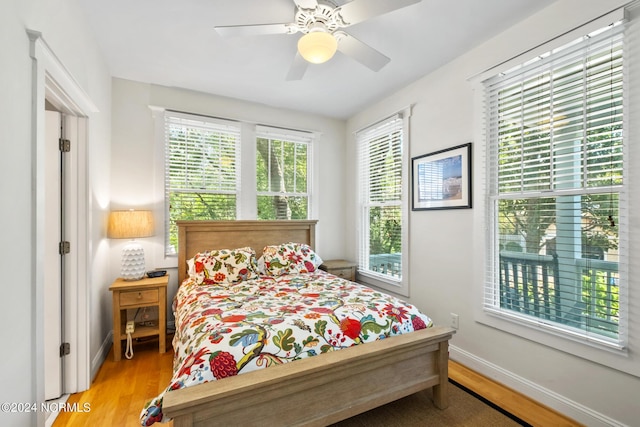 604 Currituck Way, Bald Head Island, NC 28461 - bedroom with light wood-type flooring and a ceiling fan