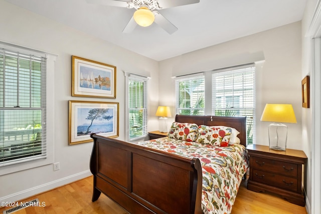 604 Currituck Way, Bald Head Island, NC 28461 - bedroom with light wood-type flooring and a ceiling fan
