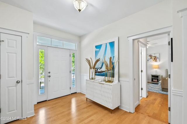 604 Currituck Way, Bald Head Island, NC 28461 - foyer featuring light wood-style flooring and wainscoting