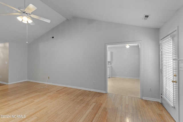 unfurnished bedroom featuring lofted ceiling with beams, ceiling fan, and light colored carpet