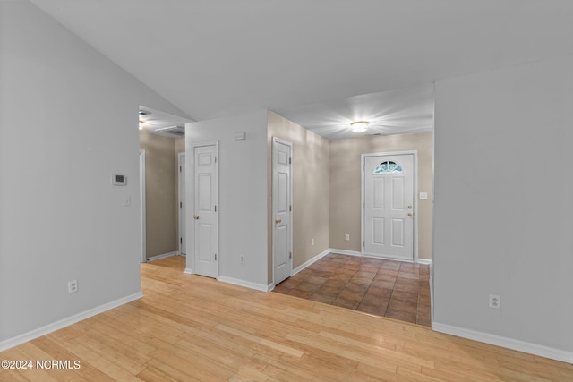 foyer featuring light tile patterned floors