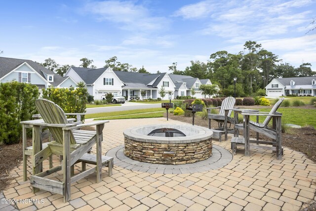 view of patio featuring a fire pit