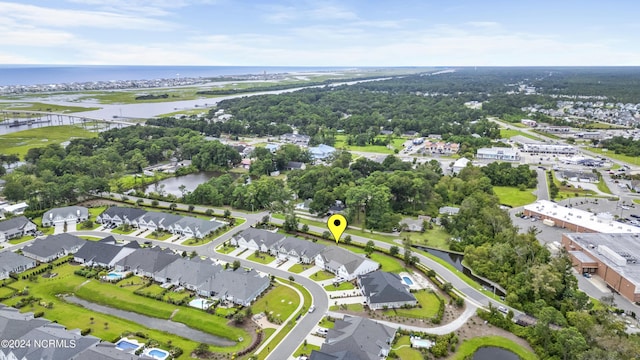 bird's eye view with a residential view and a water view