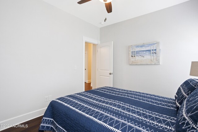 bedroom featuring ceiling fan and hardwood / wood-style flooring