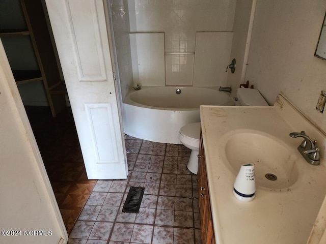 full bathroom featuring vanity, bathtub / shower combination, and toilet