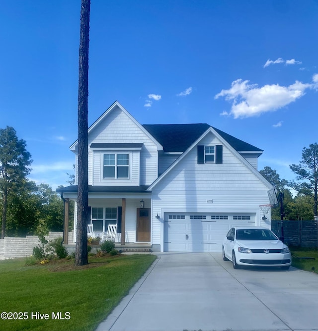 4033 Silver Ln, West End, NC 27376 - view of front of property with a porch and concrete driveway